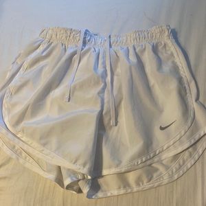 White Nike shorts
